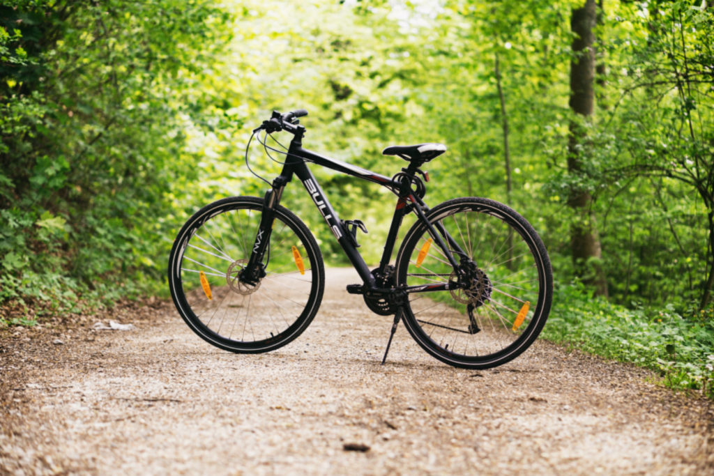 black-bike-into-the-woods