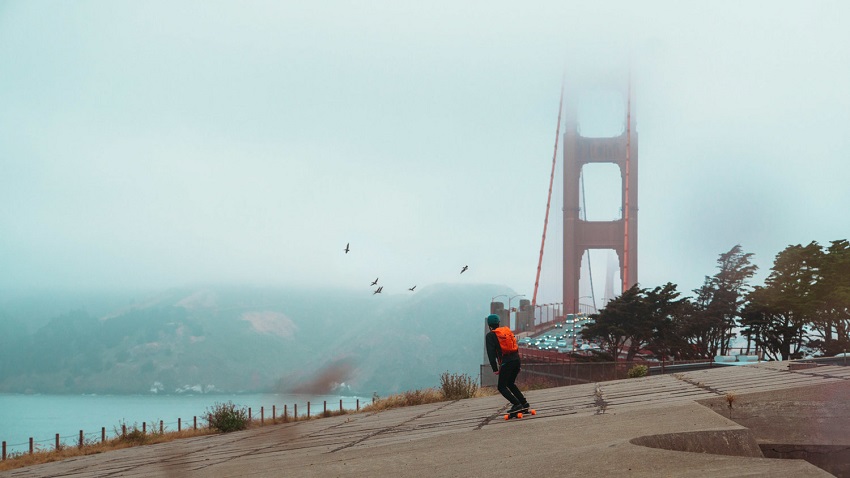 Guy on boosted board