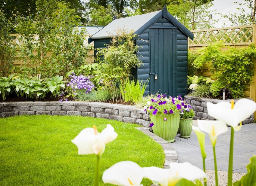 green outdoor shed in garden