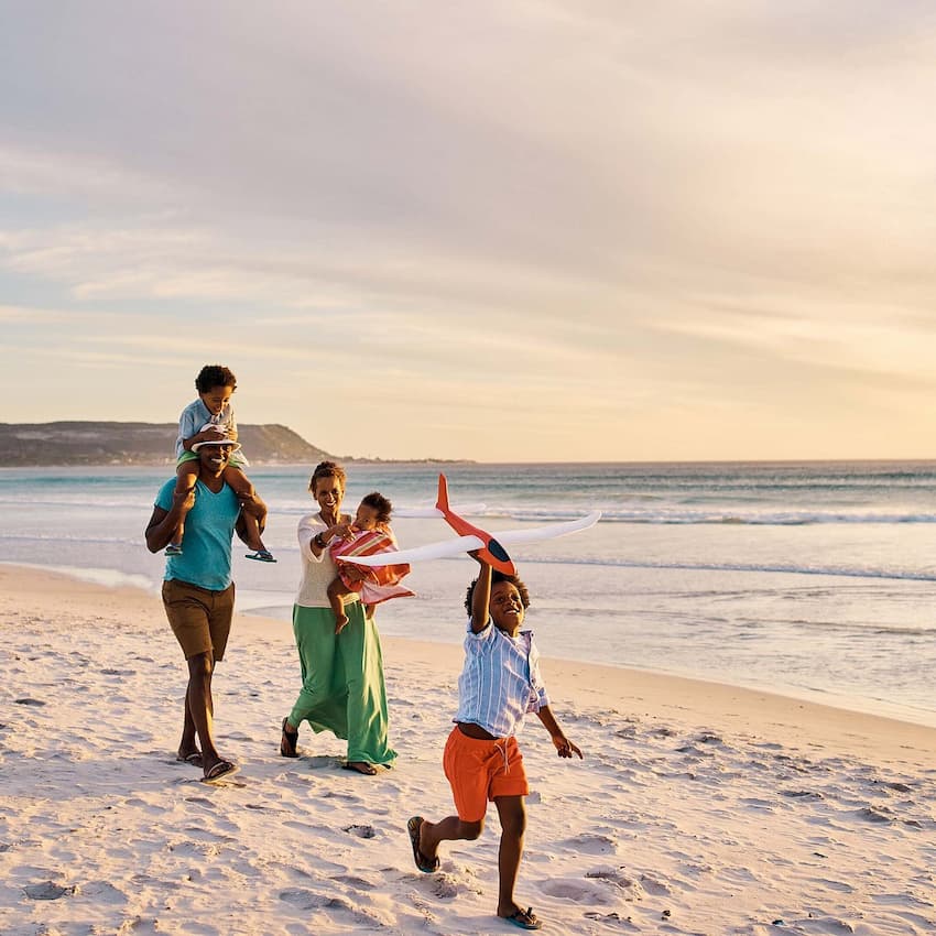 Parents with kids at the beach